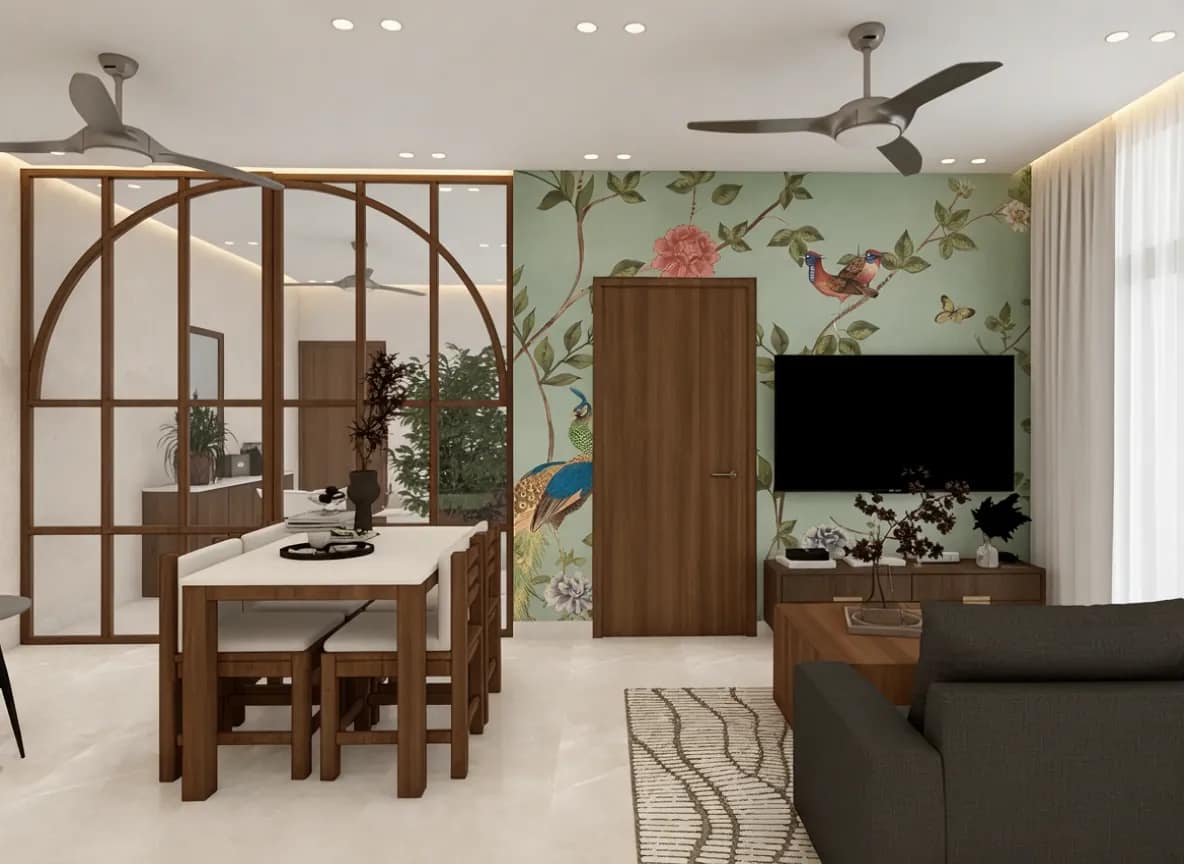 Interior Design Beyond Panels: Creative, Psychology-Led Ideas for Happier Kolkata Homes 13 Living and dining area with peacock bird wallpaper, wooden arched glass partition, walnut dining table with white cushioned chairs, charcoal sofa and walnut TV unit